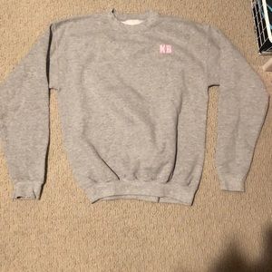 Grey crewneck sweatshirt